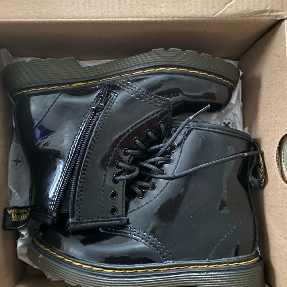 Kids Dr. Martens black patent boots